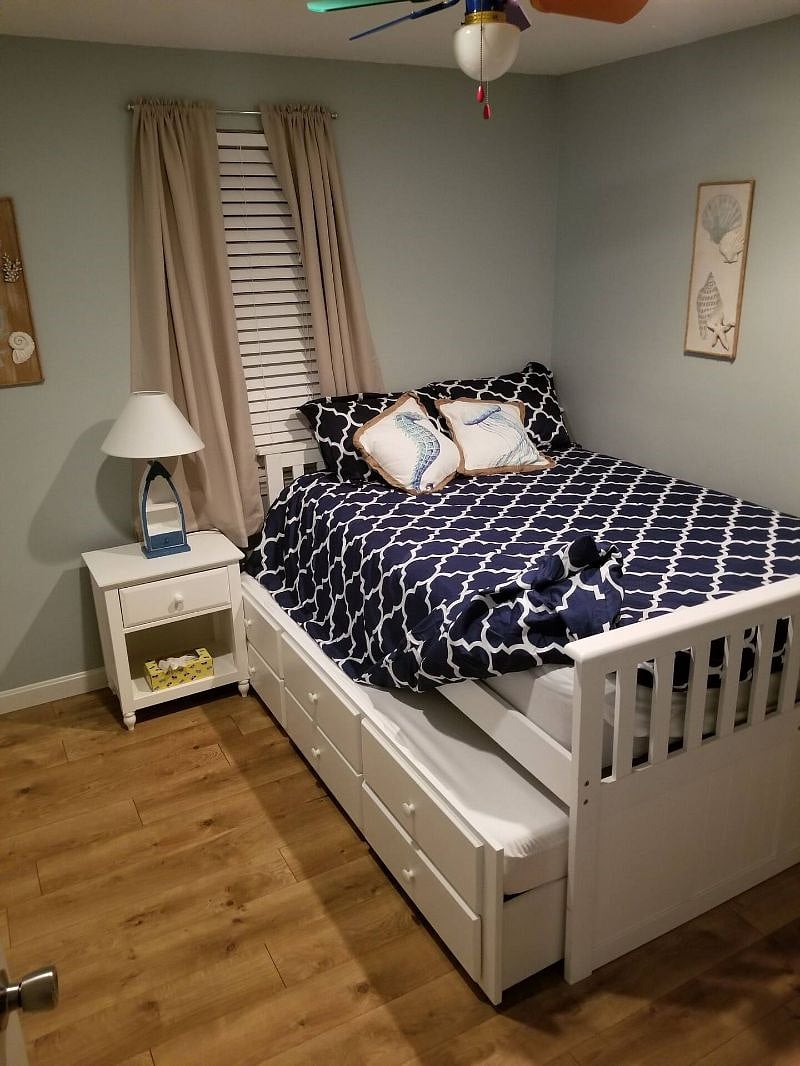 2nd bedroom/trundle- ceiling fan, closet, dresser