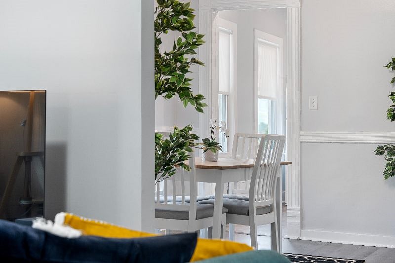 The living room leads into the spacious dining room.