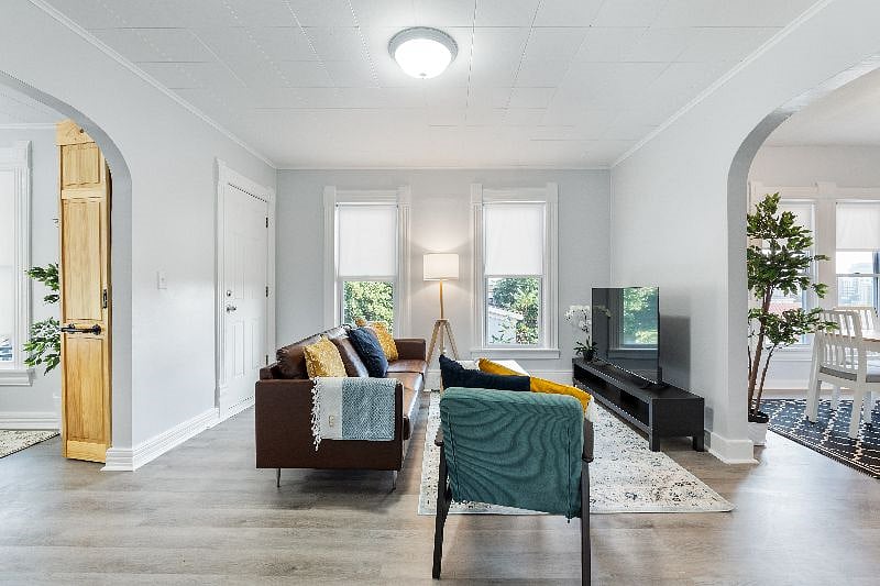 The living room has an entrance to the private balcony.