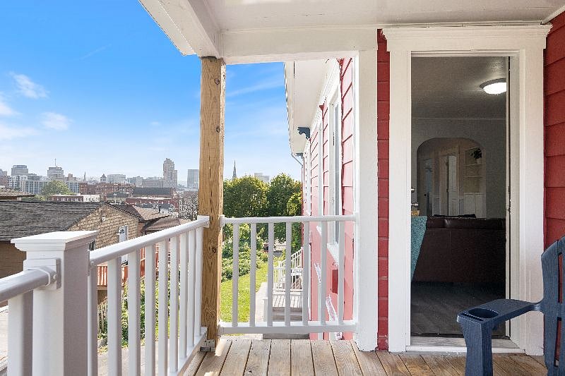 Enjoy a coffee or a midday meal on the private balcony with city views.
