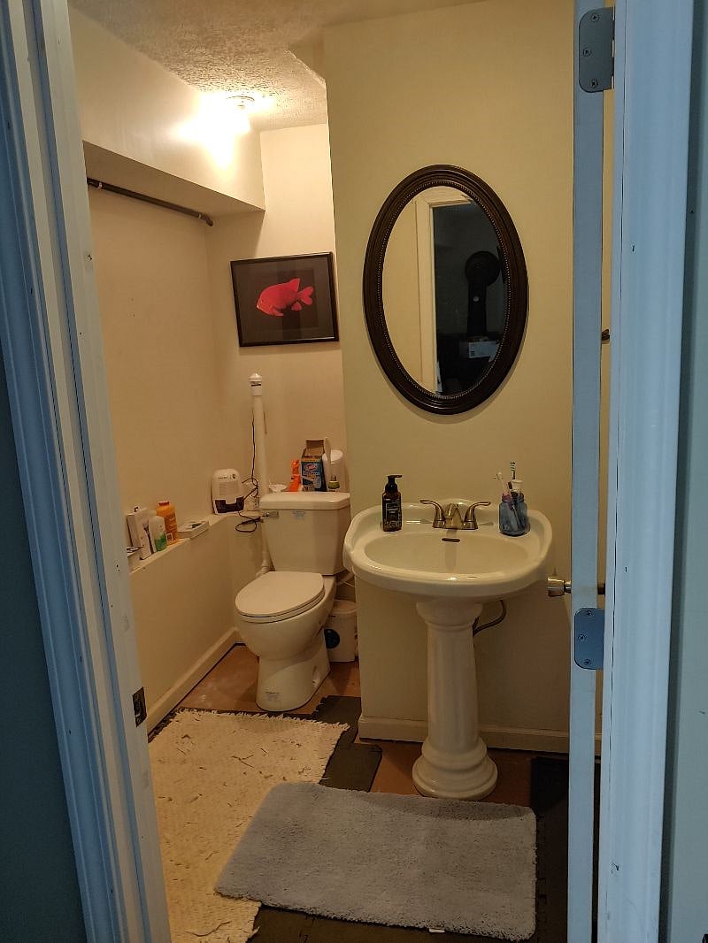 Unit 3: Private Bathroom with full tub and shower on Lower Level (ensuite with bedroom pictured above).