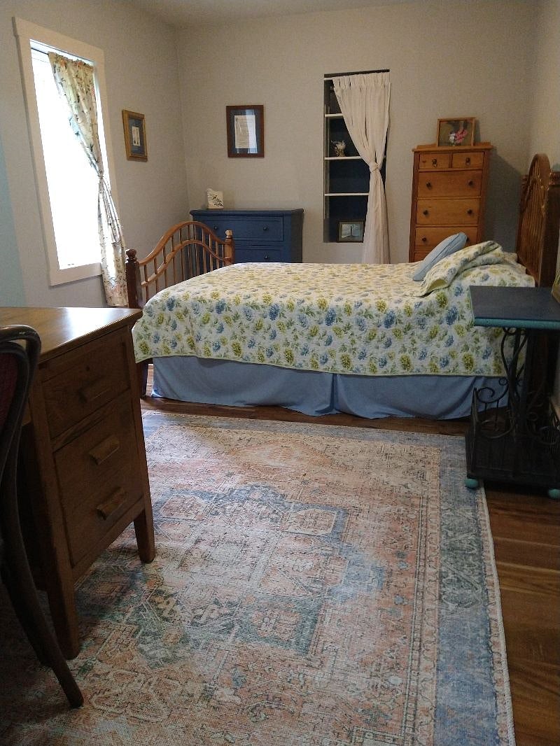 Unit 1- Full bed (double) in bedroom #1 of 2 in the unit.  This bedroom is on the main level off of the living room and across the hall from the only bathroom in the unit.