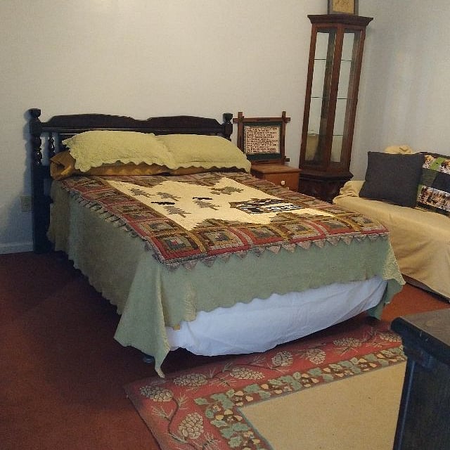 Unit 2: One bedroom unit with kitchenette.  Bedroom with full (double) bed, attached master bath with jacuzzi tub and walk in closet.