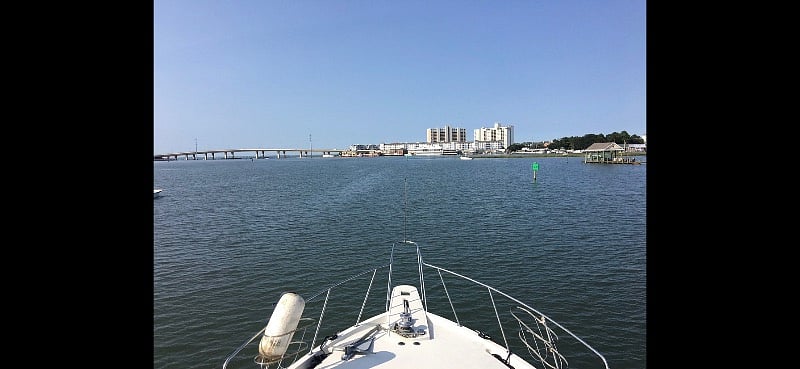 View from my old motor yacht heading North on the Lynnhaven River to the Lesner Bridge and the Lynnhaven Inlet. Several great seafood restaurants on both ends of the bridge.