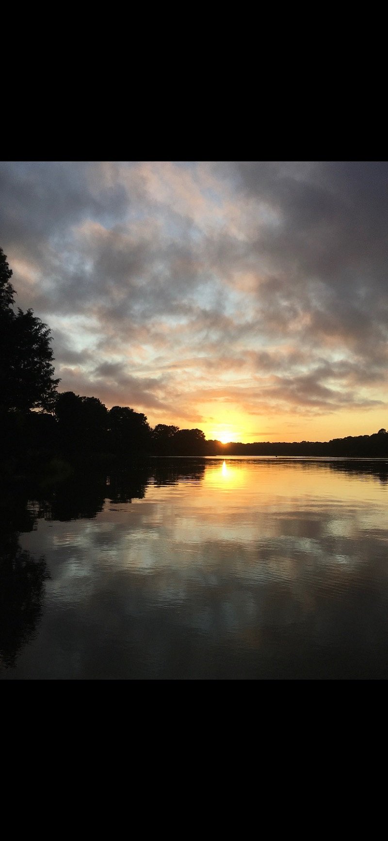 Sunset on the Wolfsnare Creek as it enters the Lynnhaven River just a few miles South of the Lesner Bridge. Taken from my canoe. That's where Linda and I live. 