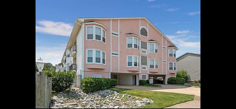 Three story condo with ground floor garage, 12 units, plus rooftop deck with 3 picnic tables and umbrellas, plus view of the entire Chesapeake Bay all the way North to the Eastern Shore! 