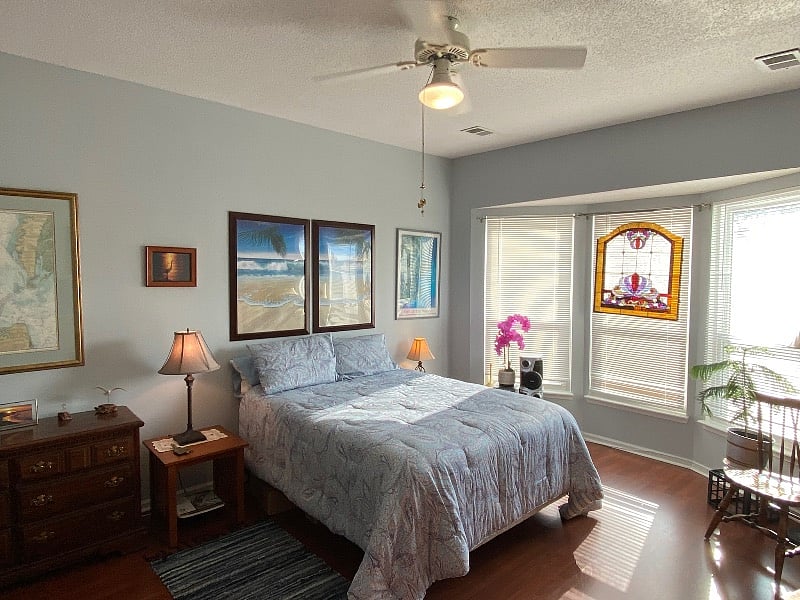Beautiful antique stained glass diffuses the bright sunlight that pours into the condo from the West!