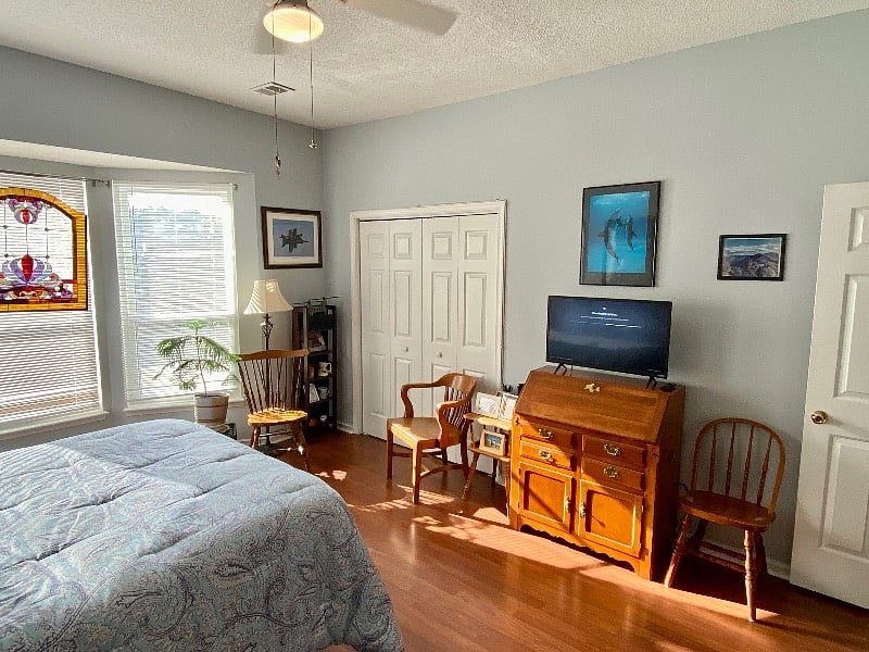 Antique fold-down desk is convenient and traditional. The new TV can remain there for comfortable viewing from bed, or be placed elsewhere as desired. 