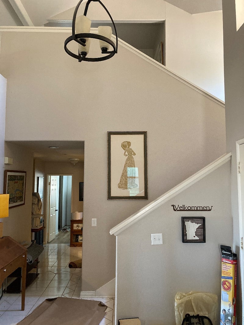 Entryway and hallway to downstairs BRs