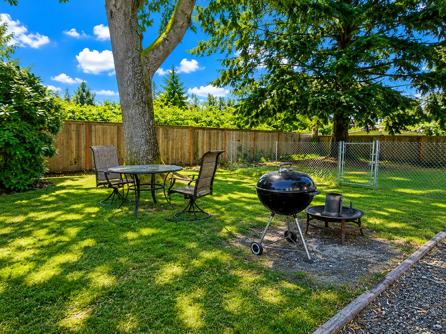 Large, Fully Fenced Backyard with Patio Dining Set, Fire Pit, BBQ Grill & Spacious Storage Shed