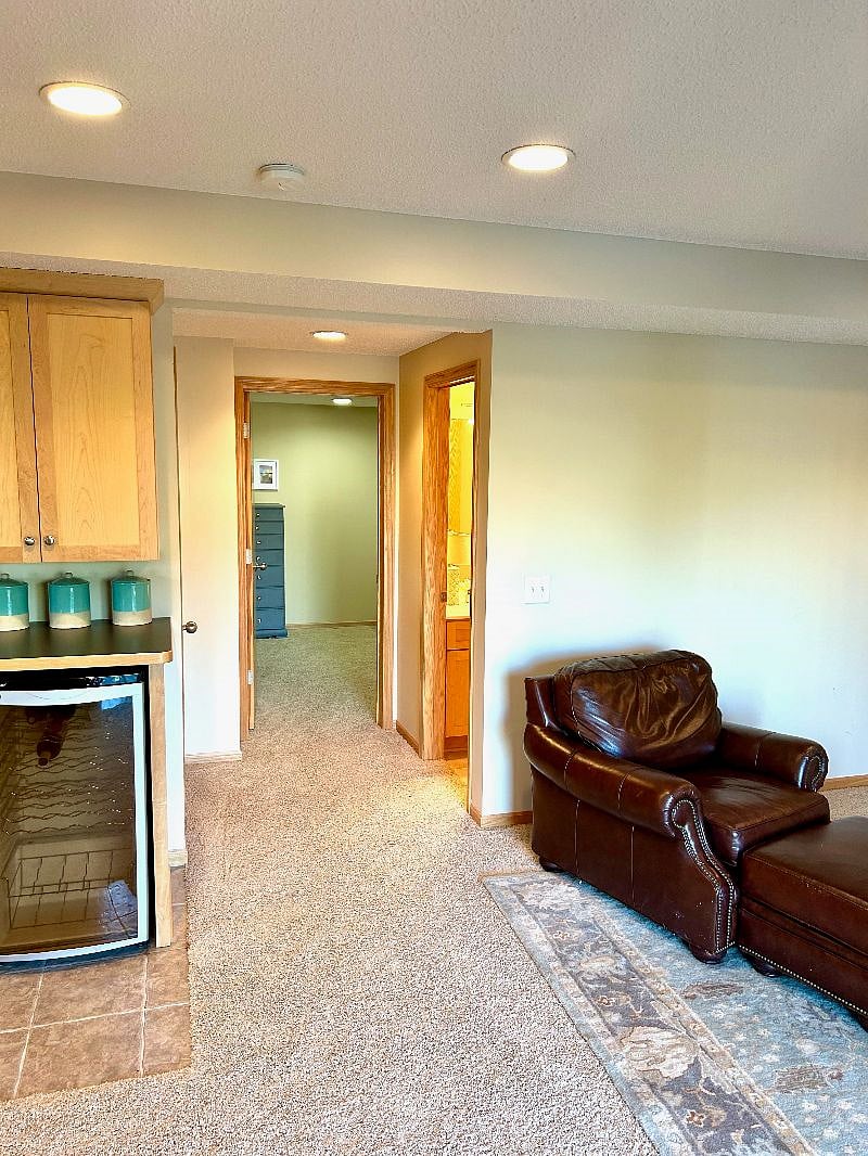 The view when you walk in with the bedroom to the back, and bathroom on the right.