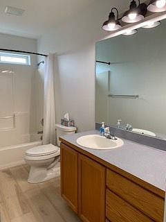 First bathroom with tub/shower combo