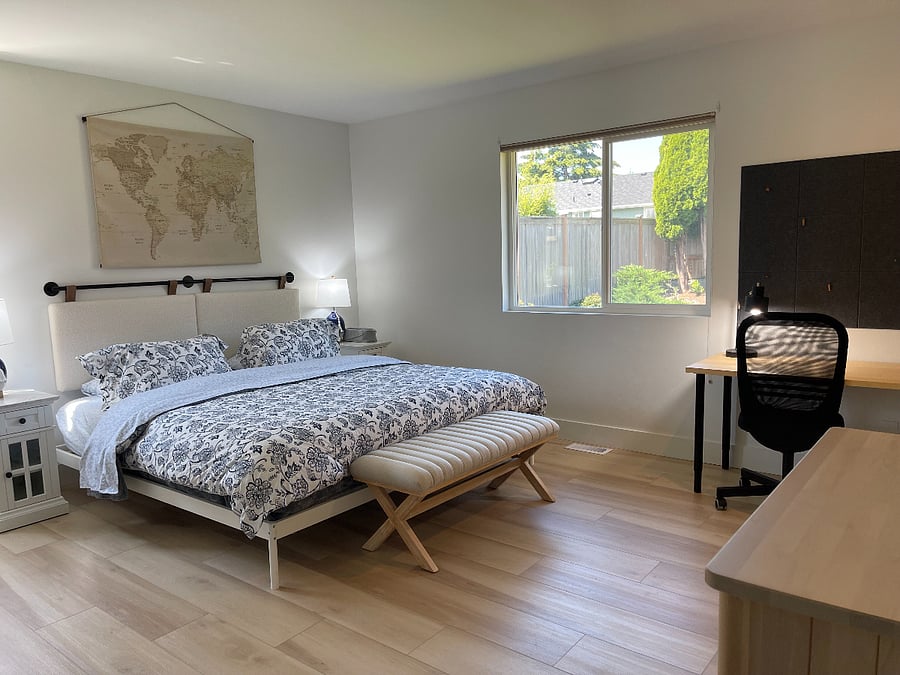 Master bedroom with dedicated work space and Smart TV