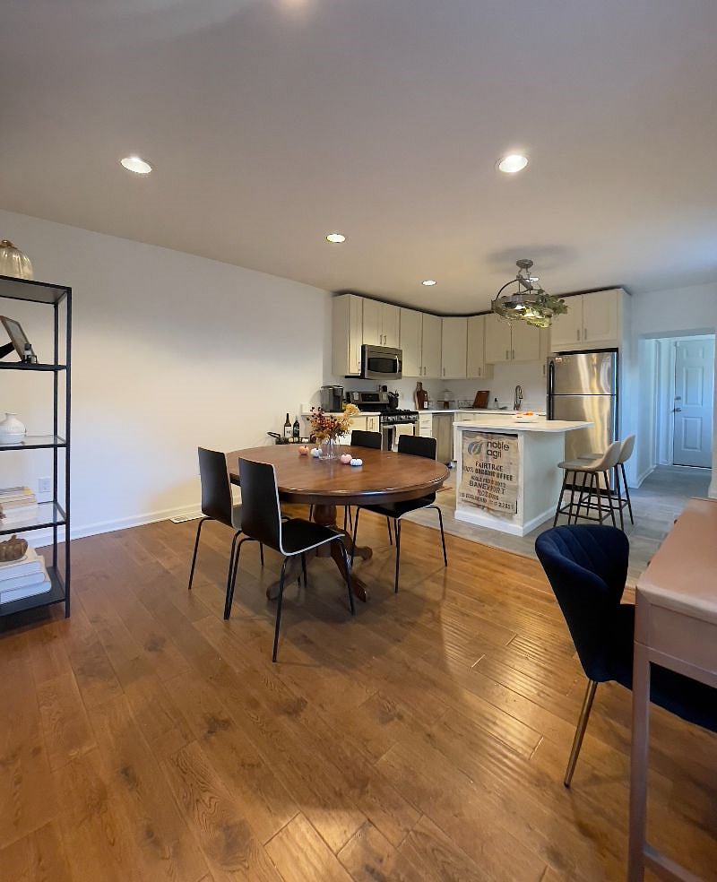 dining room/kitchen area view from the living room (seasonal decor will be a thing)