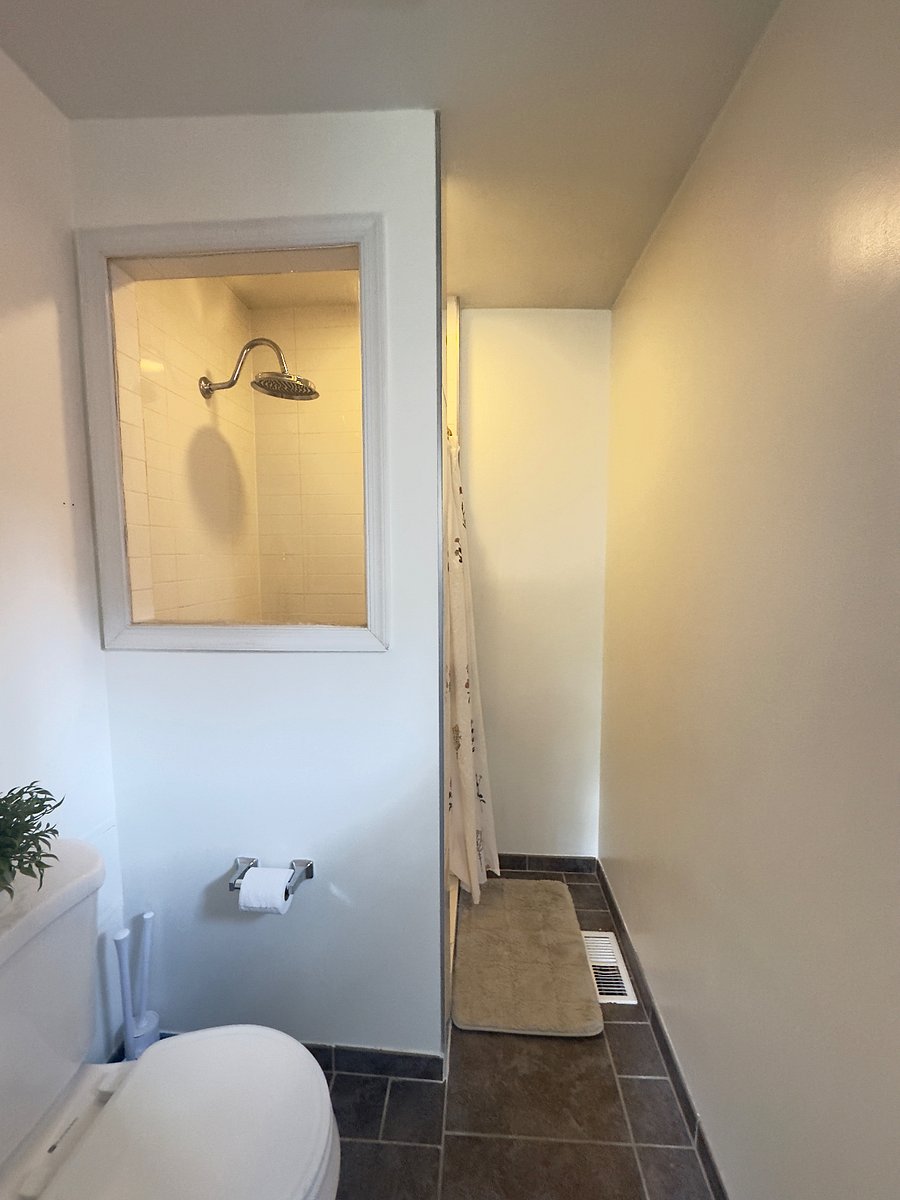 rainfall shower head and light in shower