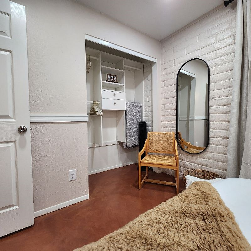 Bedroom 2 - Full size mirror and seating area
