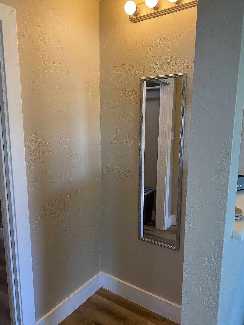 Vanity area with mirror