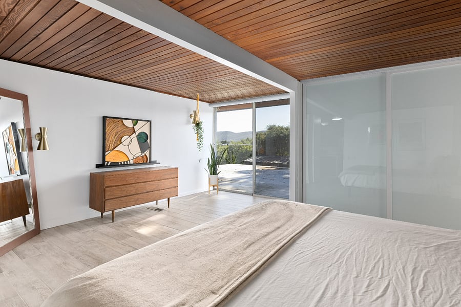 Master Bedroom with onsuite bathroom and view of the mountains. This bedroom has a master bedroom with lots of storage in the closets and 3 dressers
