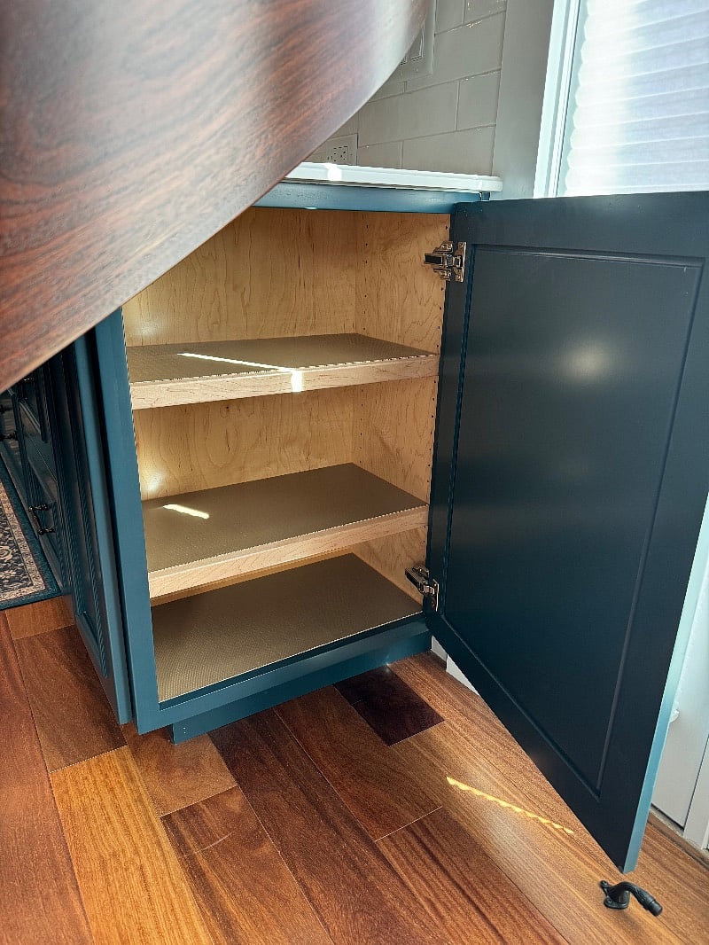 Hidden storage under stair