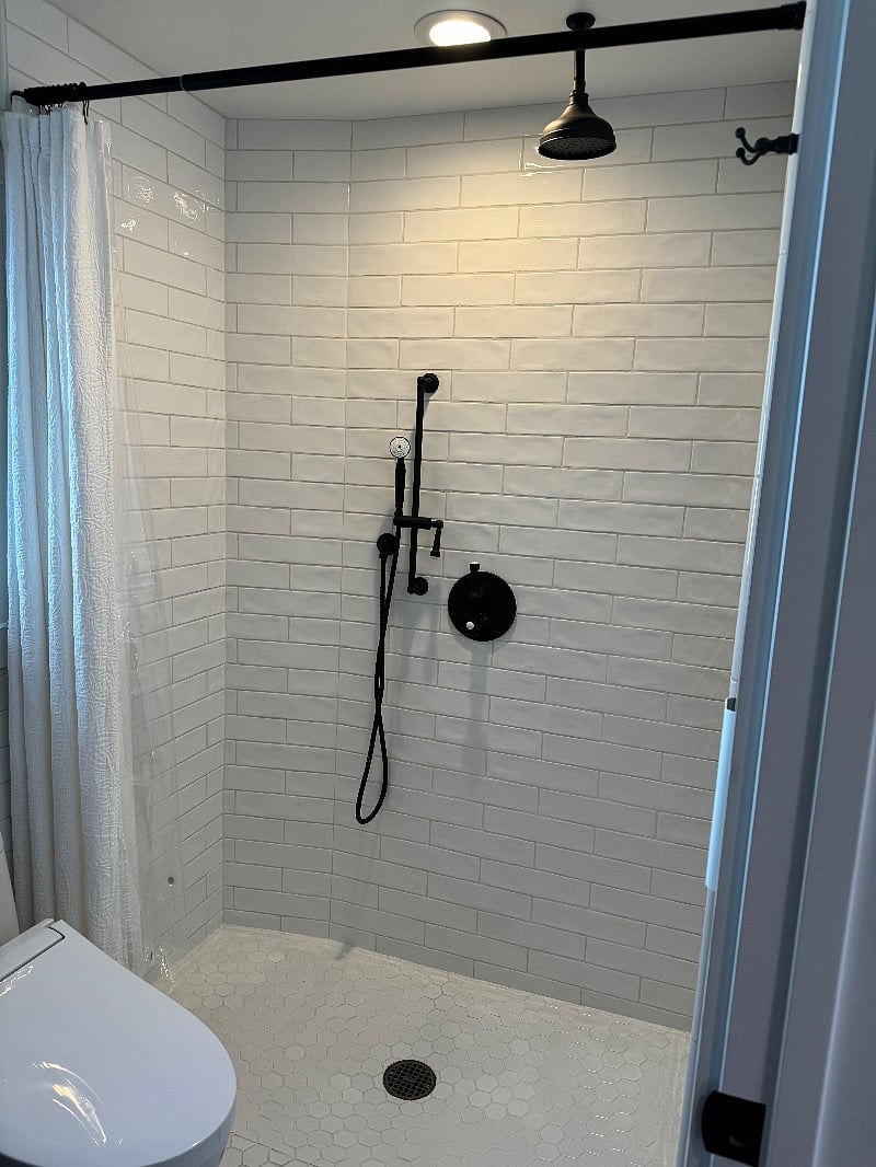 Hand held and rain head shower