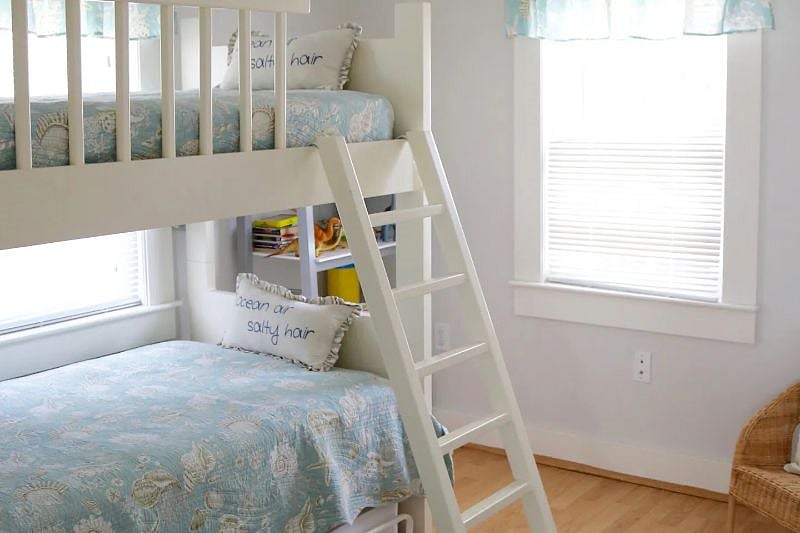 Main level bedroom with bunk bed and trundle bed * Room has been repainted and Pottery Barn bunk bed has replaced metal one.