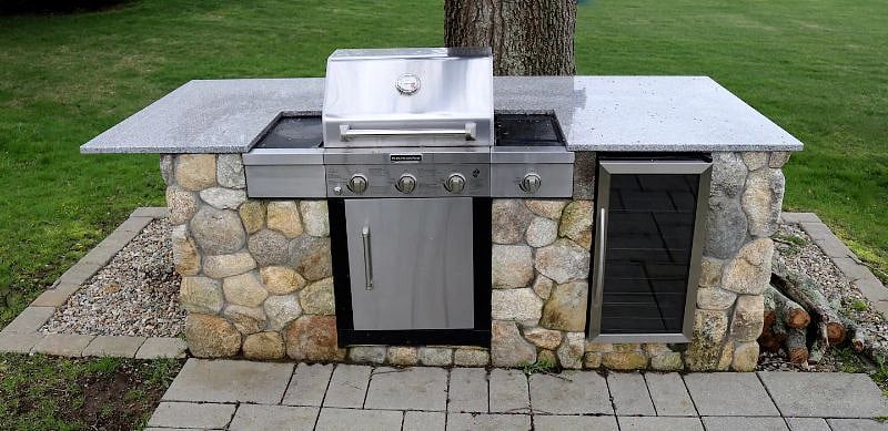 Outdoor kitchen with wine/drink refrigerator