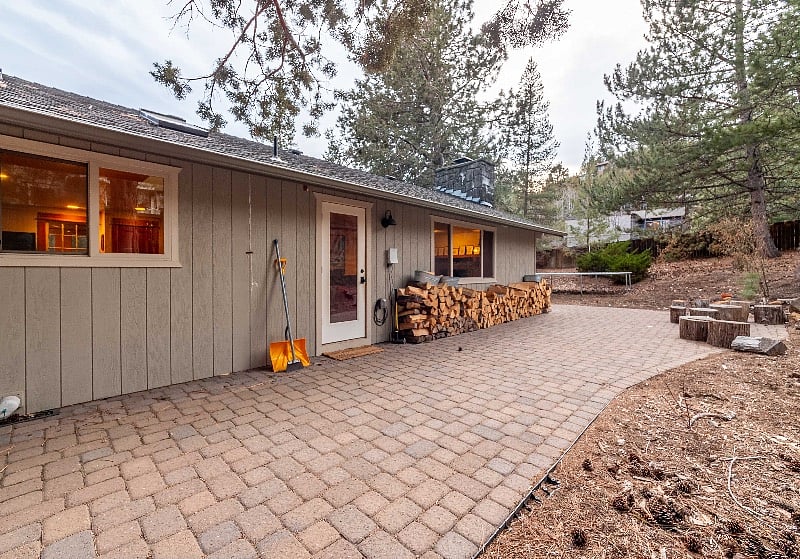 Fire pit in backyard with ample wood