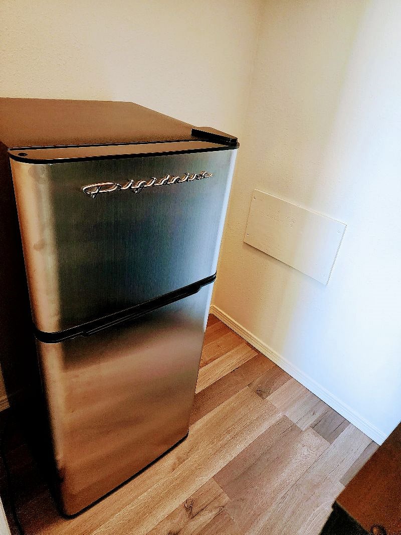 Large mini-refrigerator available in the second bedroom.