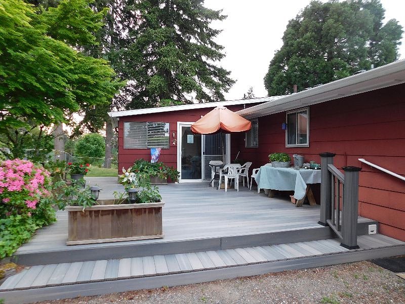 Backyard deck. Entry to the back door. 