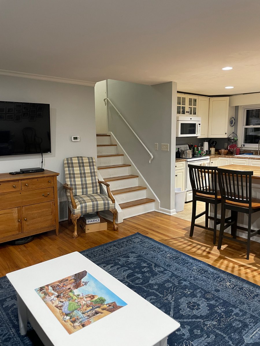 Stairway leading to the 2 private guest bedrooms and guest bathroom. 