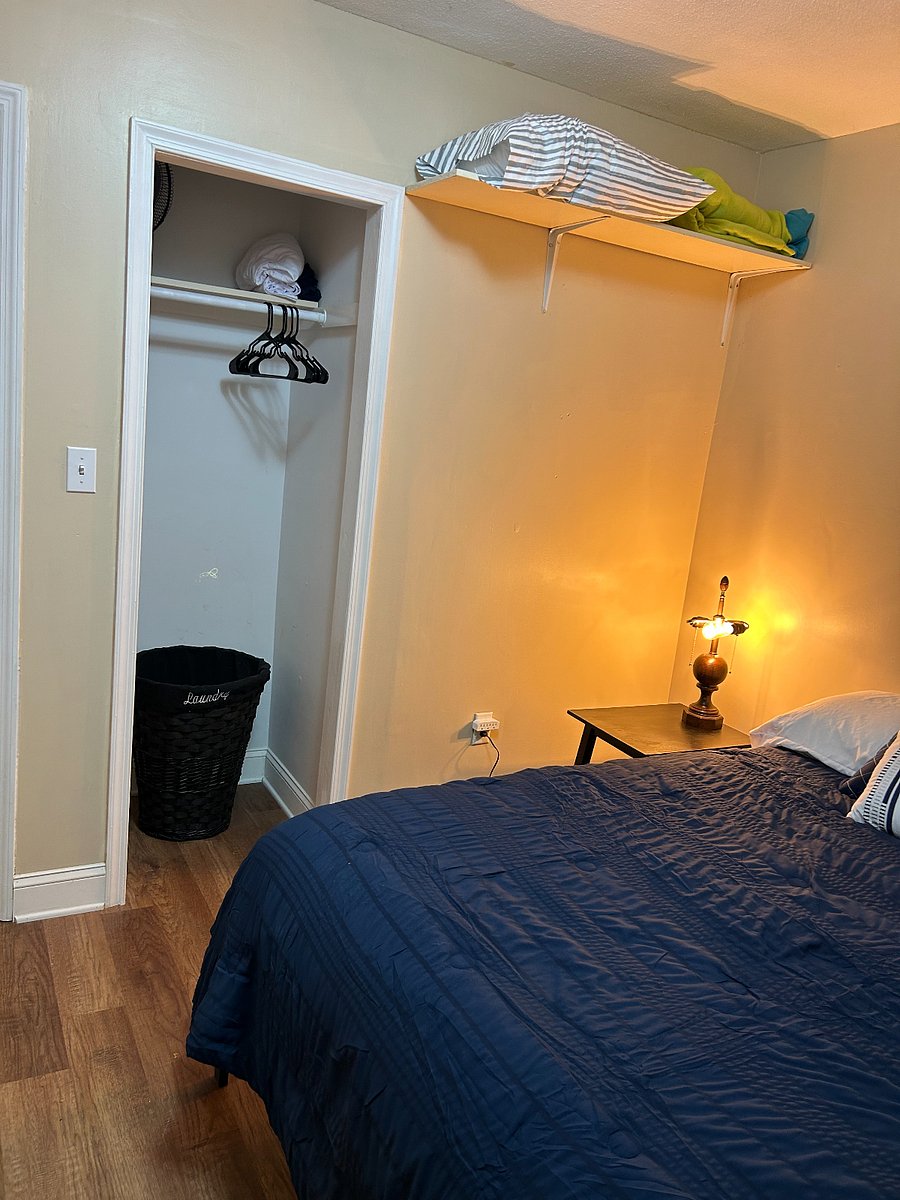Double bed, linens, pillows, dresser, Smart TV, closet, 2 night stands, side lamp, power strip