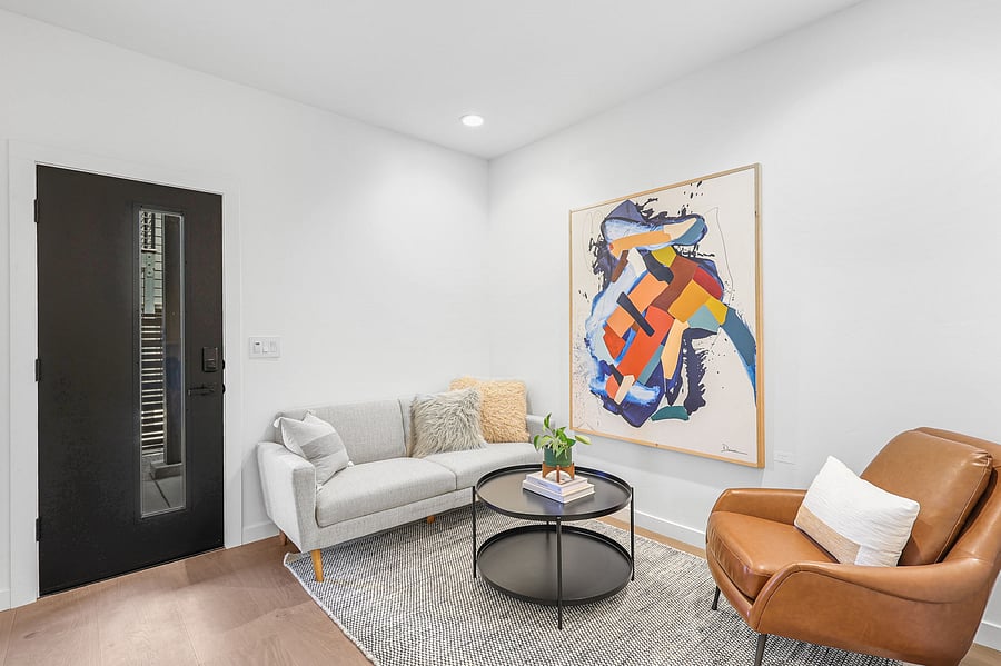 The furnishings will be similar to what is shown in the pictures but may not be exact. The living room will come a couch, accent chair, and side tables.