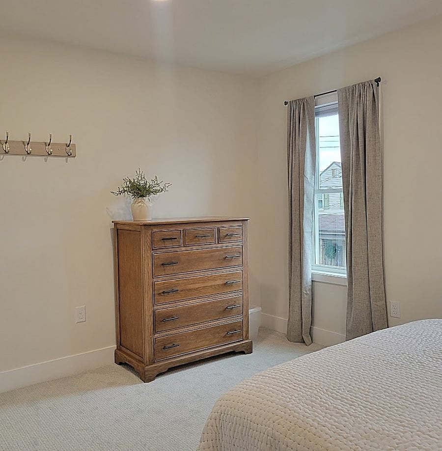 Bedroom 2 - 5 drawer dresser and wall hooks