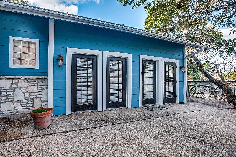 Four black doors are entrance to Studio