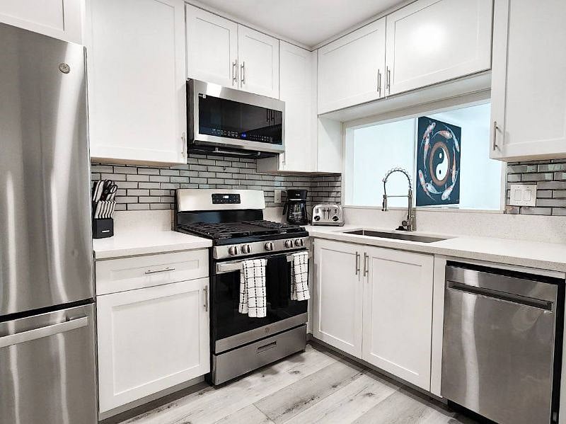 Fully stocked kitchen with all new appliances, quartz countertops, and everything else that you'll need!