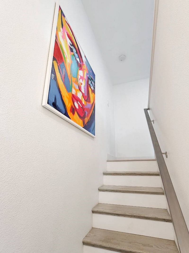 Stairs to access 2nd floor where 3 bedrooms are located