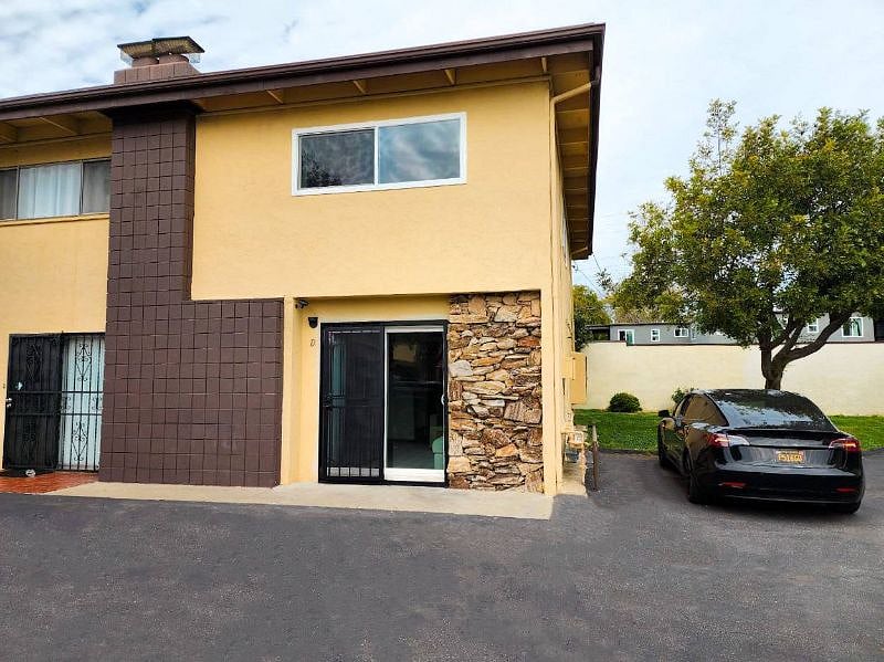 House exterior with 2 available parking spaces in front