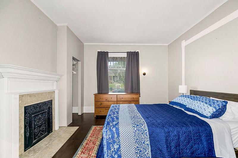 Bedroom #1 boasts a comfortable queen bed, dresser, nightstand, and spacious closet. Blackout curtains and white noise machine are provided.