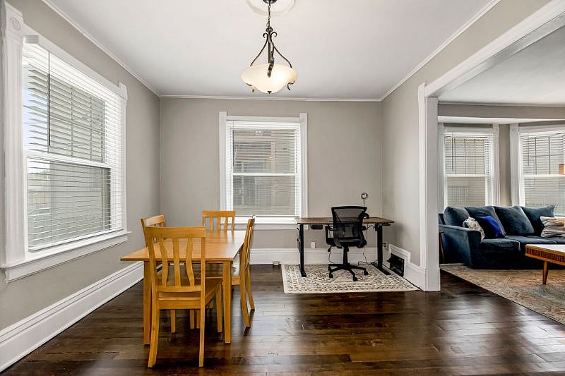 The dining room also serves as the office space. An electric standing desk and screaming fast Google Fiber make for a great work-from-home experience.