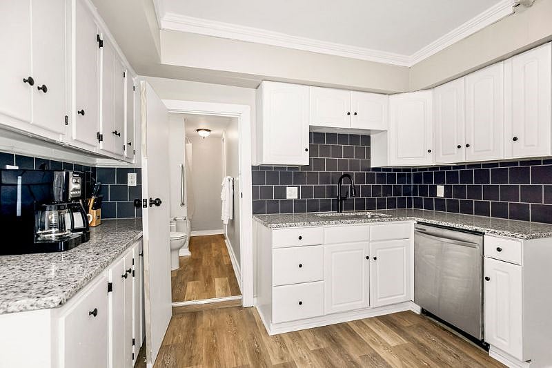 The kitchen has plenty of room and all the equipment needed for home-cooked meals.