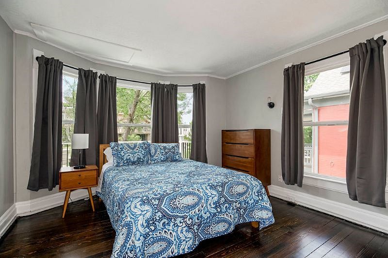 A comfortable queen bed, dresser, and nightstand are provided in each of the 2 bedrooms. 