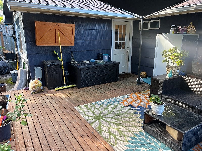 Back patio with tv, grill, and hot tub