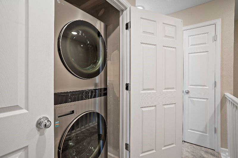Washer/dryer conveniently located in unit just steps away from the bedrooms