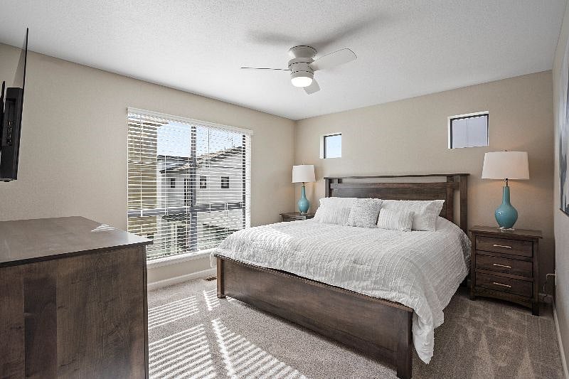 Luxurious primary bedroom with Smart TV