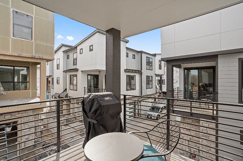 Private patio space with a gas grill and patio seating for 2