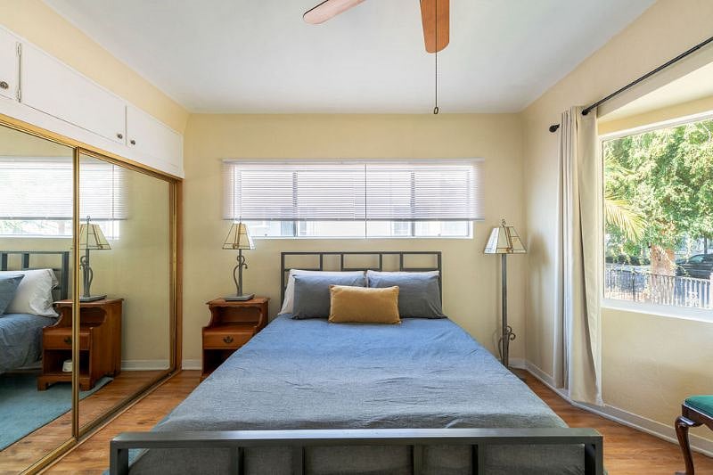 Queen sized bed, blinds and blackout curtains. 