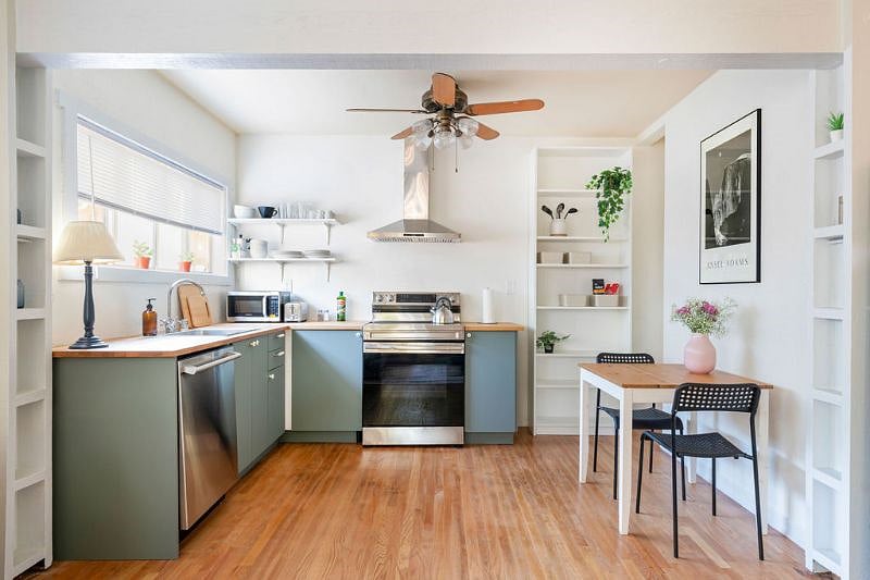 Full kitchen with dishwasher, full refrigerator, and range/oven