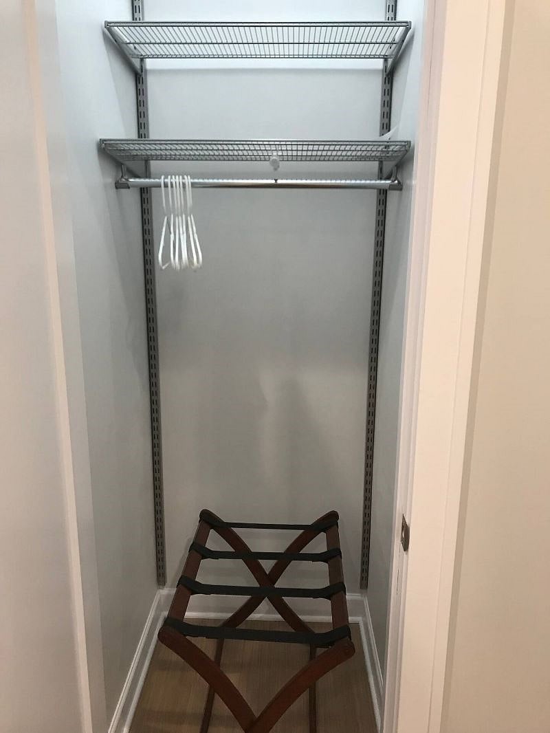 Guest Closet. (All closets in the home have been detailed with Container Store Elfa fixtures).