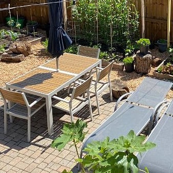 Patio overlooks garden.