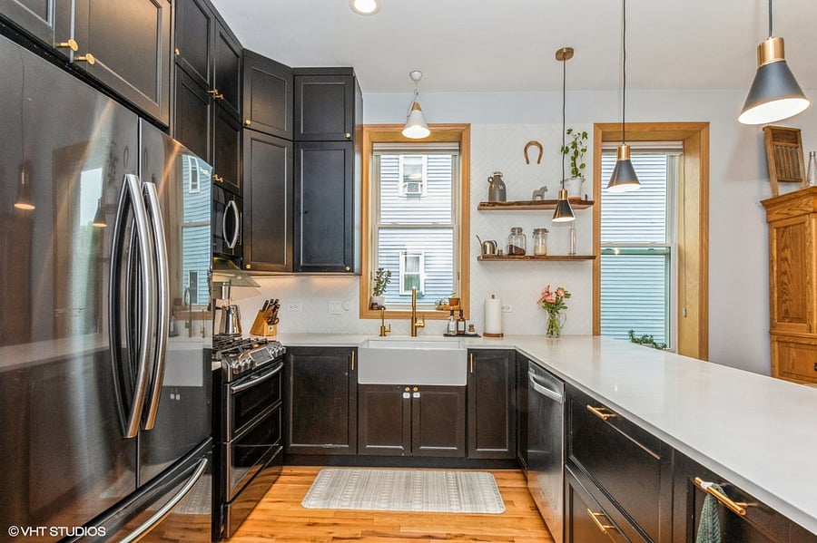 Custom matte black and gold kitchen.